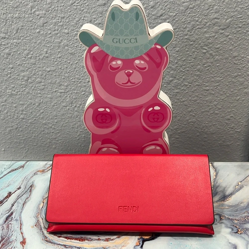Fendi sunglasses with case, cleaning cloth, and authentication card